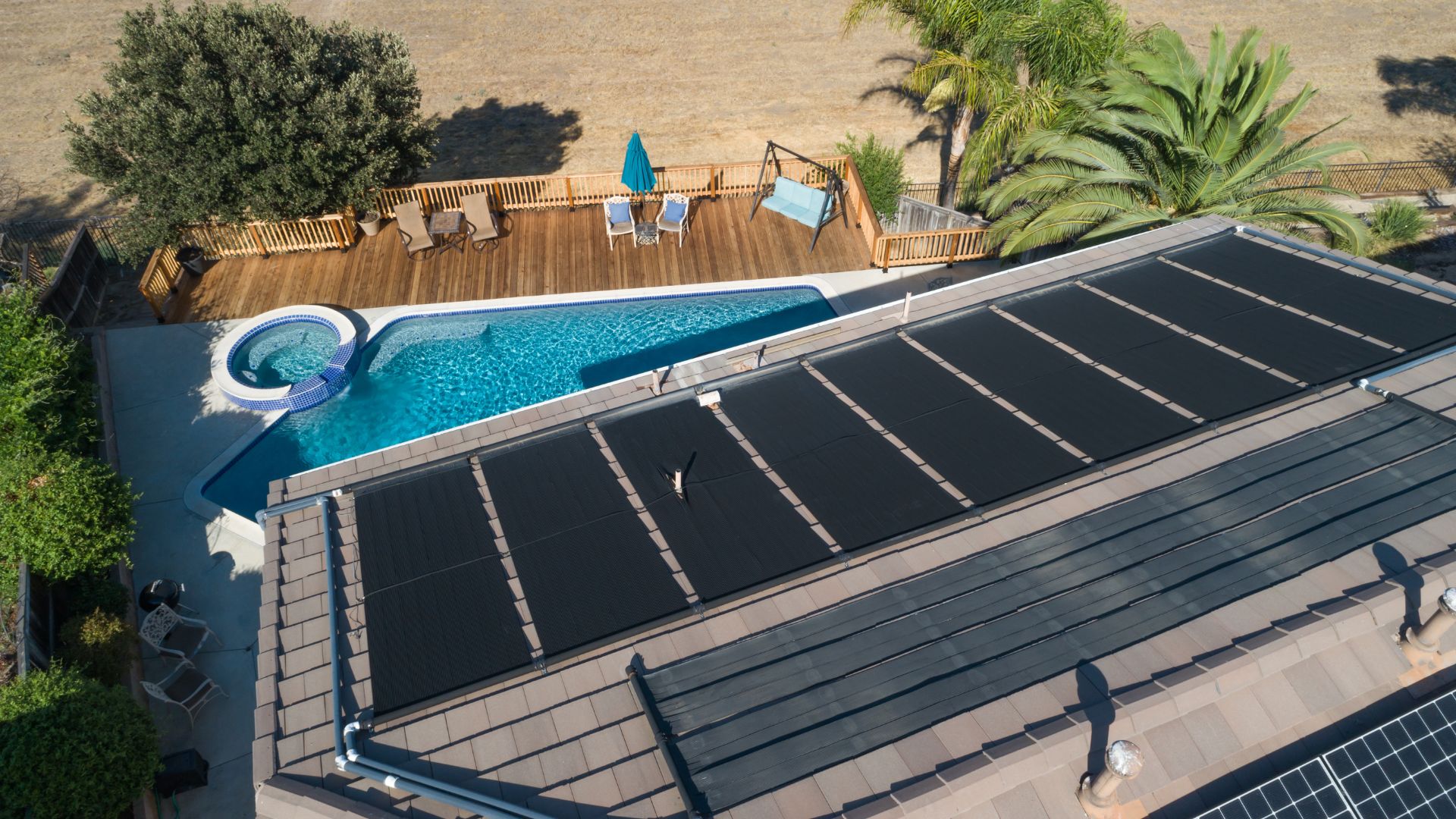 Solar thermal atop a building with a swimming pool beneath